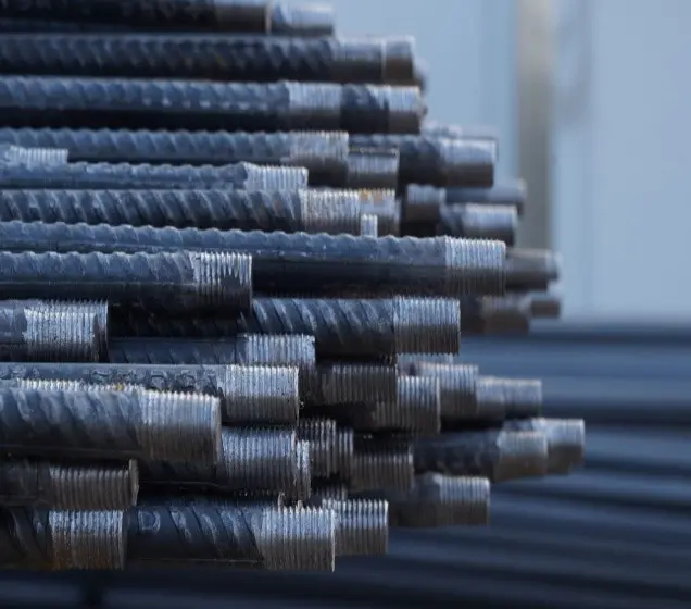 Coupler installed on threaded rebar